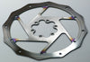 Close-up of a bicycle disc brake rotor showing wear and heat discoloration