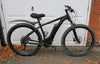All-terrain electric mountain bike with front suspension and knobby tires